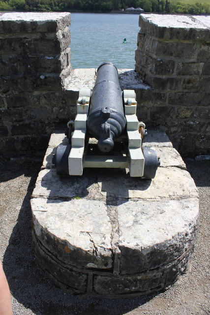 Three small cannons on the terrace at Plas Newydd, overlooking the Menai Strait — used as starting guns for boat races.